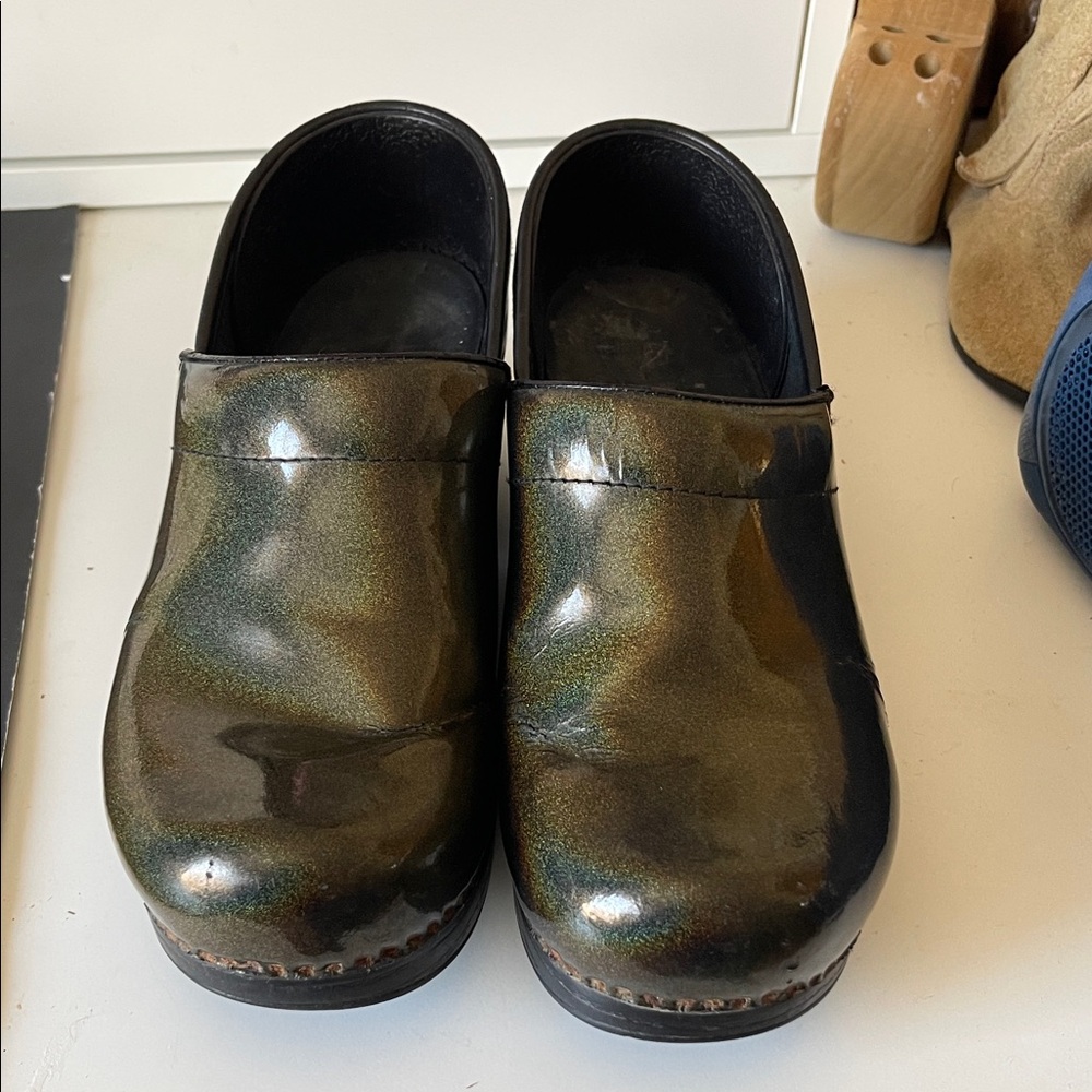 Dansko Professional Iridescent Patent Leather Clogs. D6